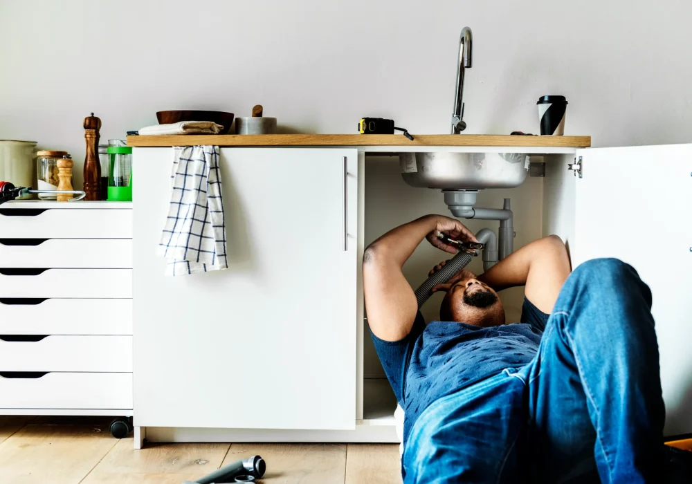 plumber-man-fixing-kitchen-sink